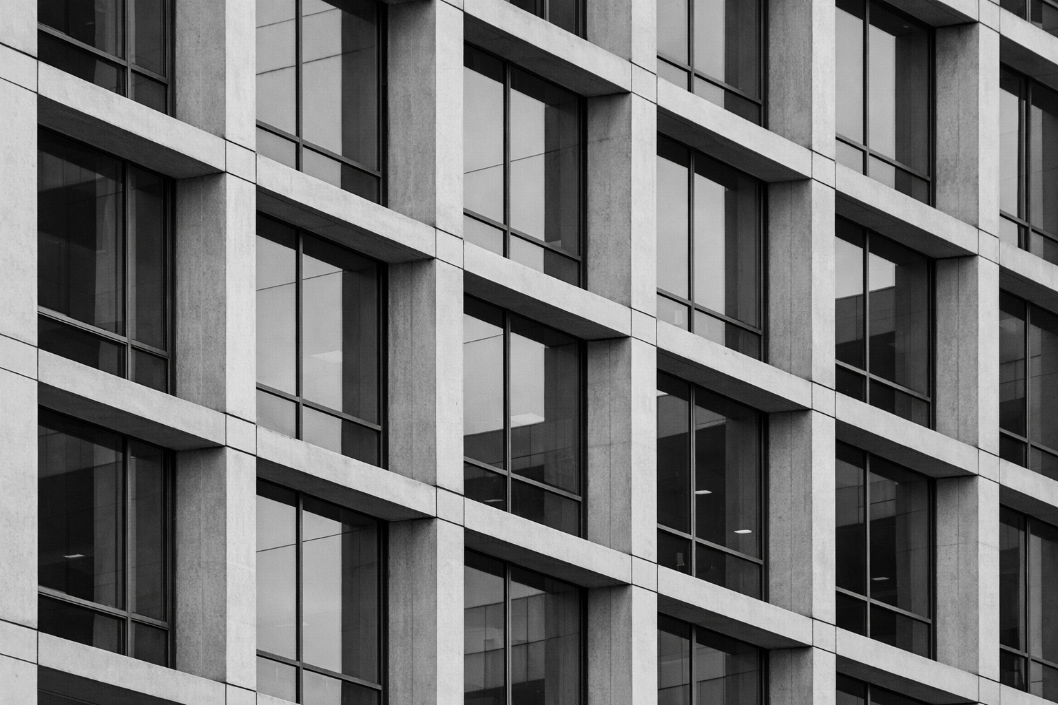 Modern architectural facade representing structure and precision